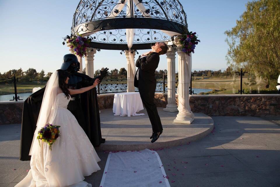 A bride works with Darth Vader to force choke her new groom at their Star Wars wedding