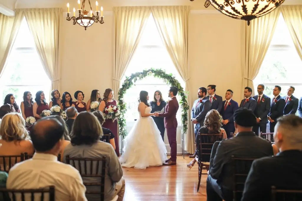 Inland Empire wedding officiant Let's Get Married by Marie leads a wedding ceremony for a bride and groom at Speakeasy on State
