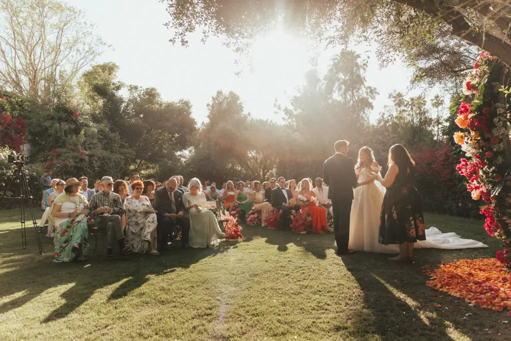An overview of the loved ones of Chris & Ashley's wedding performed by Let's Get Married by Marie at the Parker Palm Springs